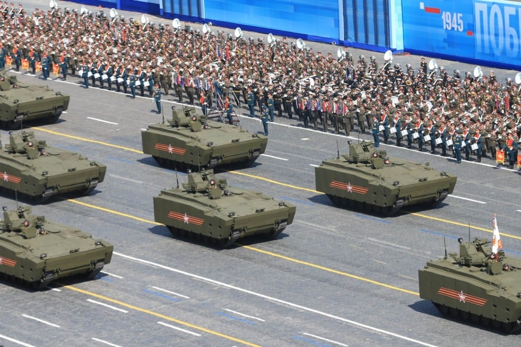 Kurganets-25 armoured personnel carriers drive through Red Square during the Victory Day military parade in Moscow on May 9, 2015. Photo: Agence France-Presse