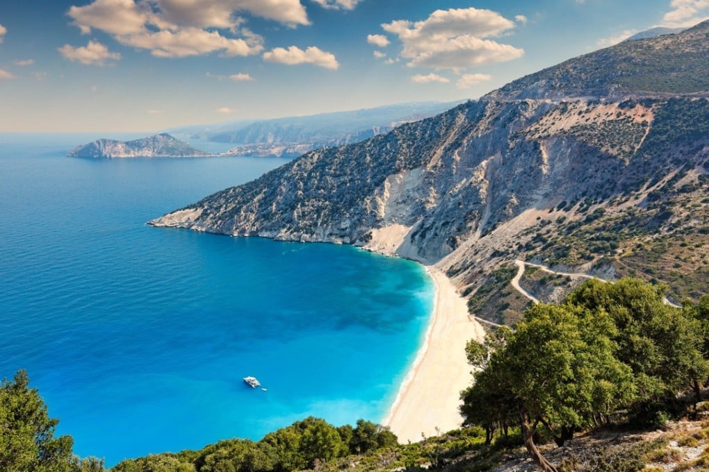 Myrtos beach, Kefalonia, Greece, was brought to life by Louis de Bernières in Captain Corelli’s Mandolin. Picture: Alamy