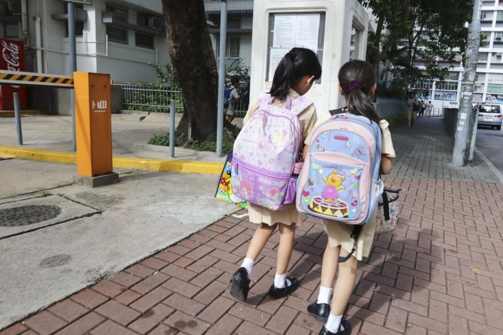 Pupils head to school in Ho Man Tin in September 2017. The start of the new term can be an anxious time for many children. Photo: Felix Wong