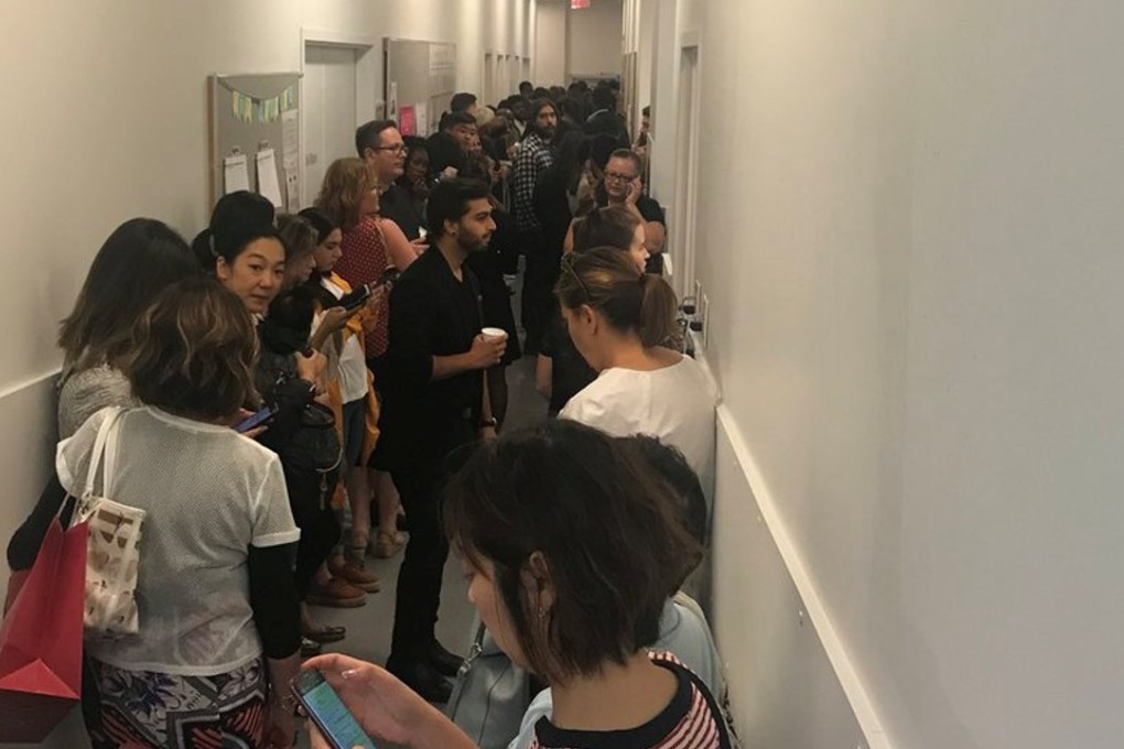 People are seen hiding in a hallway inside the Yorkdale Mall after reports of gunshots, in this still image obtained from social media. Photo: Don Datta/via Reuters