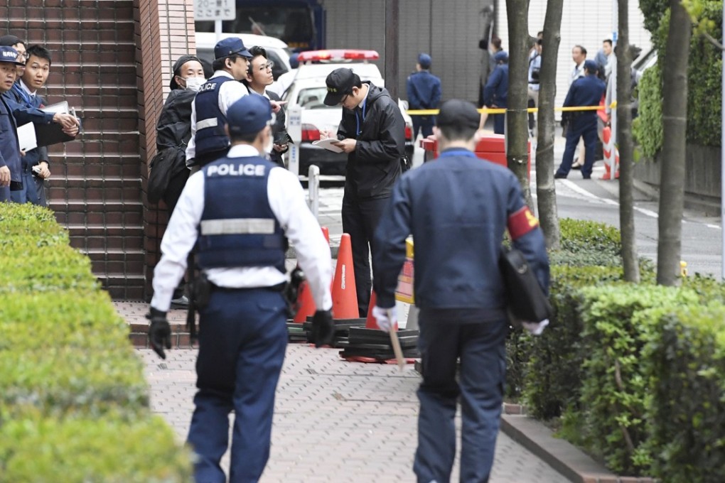File photo of police investigating the scene of a possible robbery in Fukuoka, Japan. Photo: Kyodo