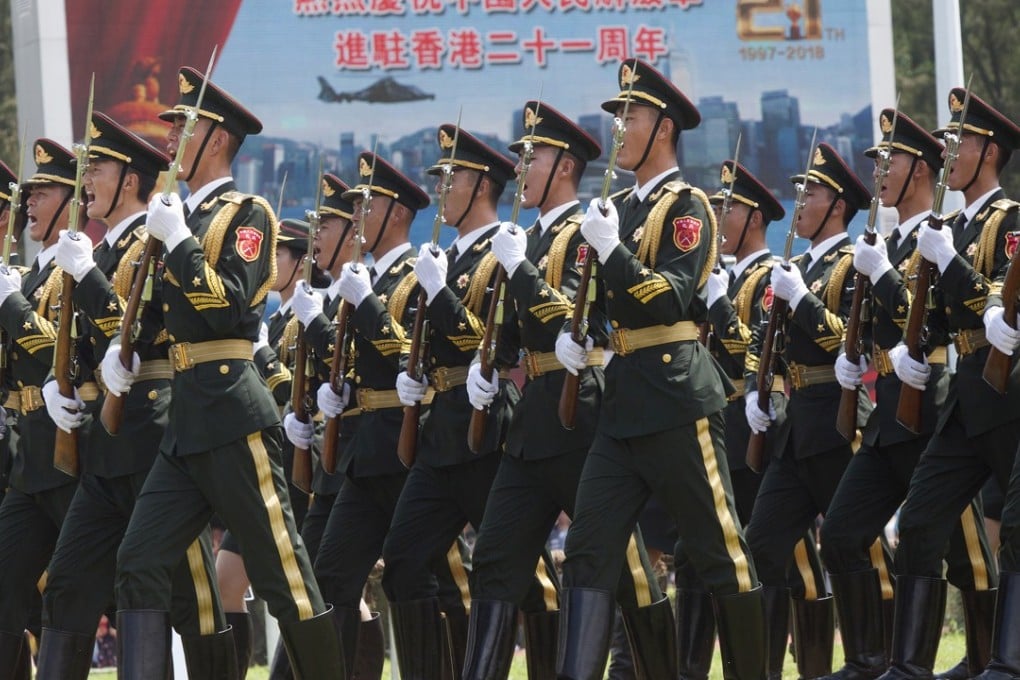 Soldiers march at a People's Liberation Army barracks open day in Hong Kong. Photo: EPA