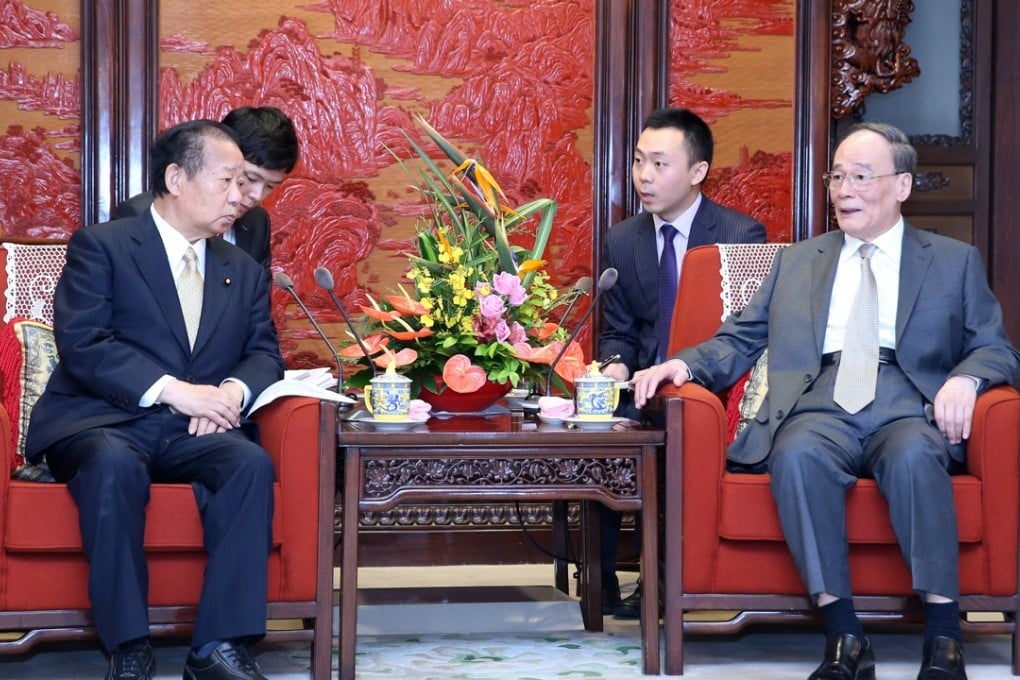 Chinese Vice-President Wang Qishan (right) meets Toshihiro Nikai secretary general of Japan’s ruling Liberal Democratic Party, in Beijing on Friday. Photo: Xinhua