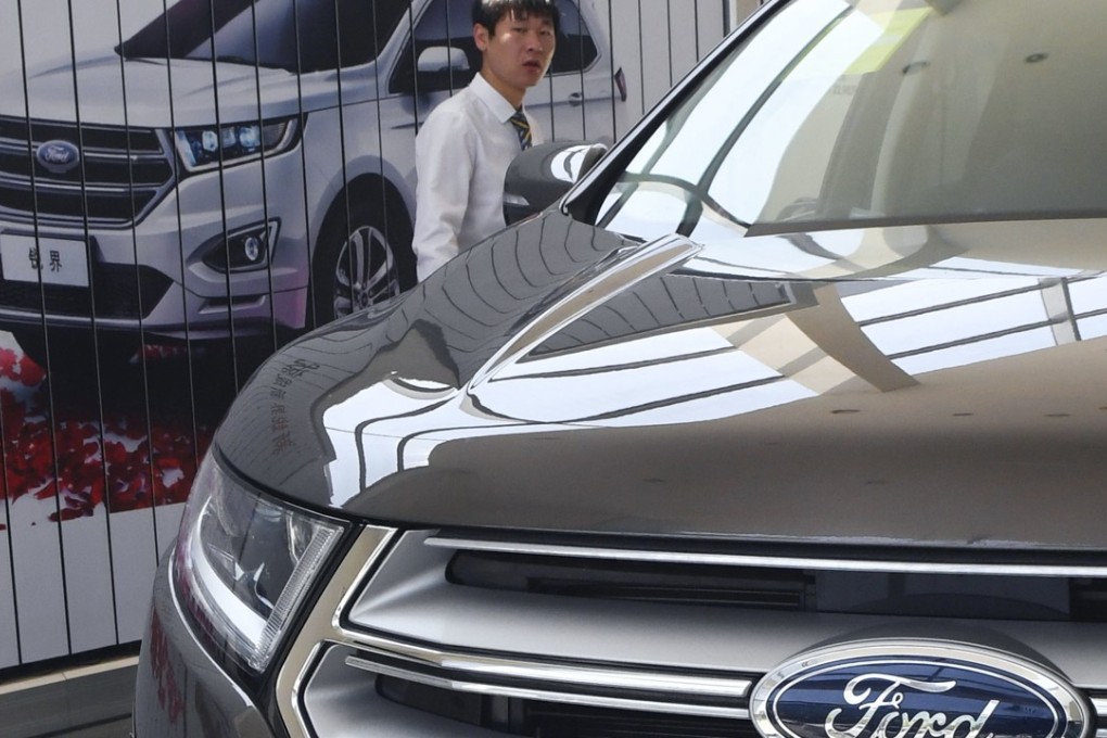 A Ford vehicle parked at a showroom in Beijing in August. Photo: Kyodo