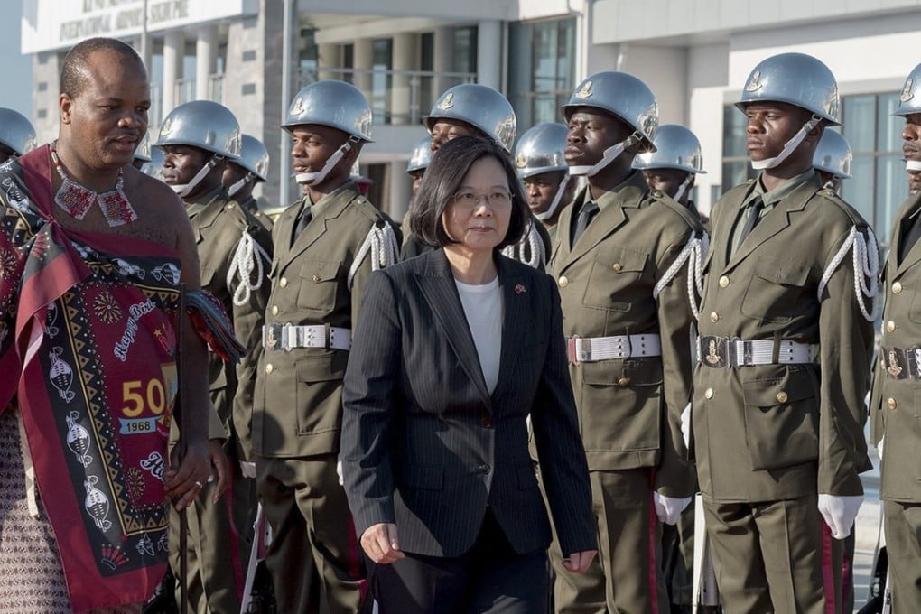 Amid an exodus of allies, Taiwan risks losing its sovereignty, analysts say. Pictured: Tsai Ing-wen with King Mswati III of Swaziland. Photo: EPA