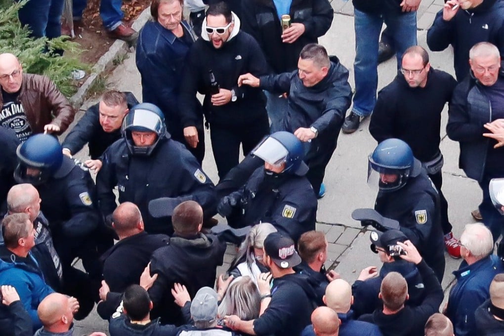 Demonstrators scuffle with police in Chemnitz, Germany on September 1, 2018. Photo: Reuters