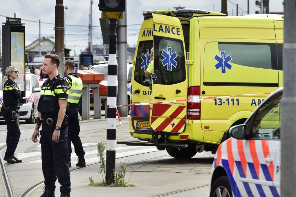 Police officers at Amsterdam's Central Station, the Netherlands, where two people were injured in a stabbing incident on Friday. Photo: Xinhua