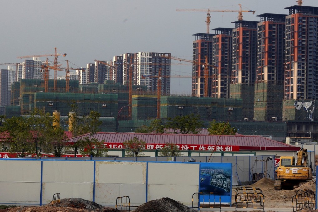 Residential flats under construction in the southern city of Shenzhen. Photo: Reuters