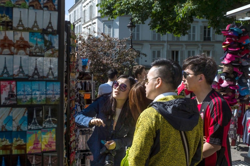 In France, the average Chinese tourist spent 11,386 yuan (US$1,667) with Alipay, almost four times than the average. Photo: AFP