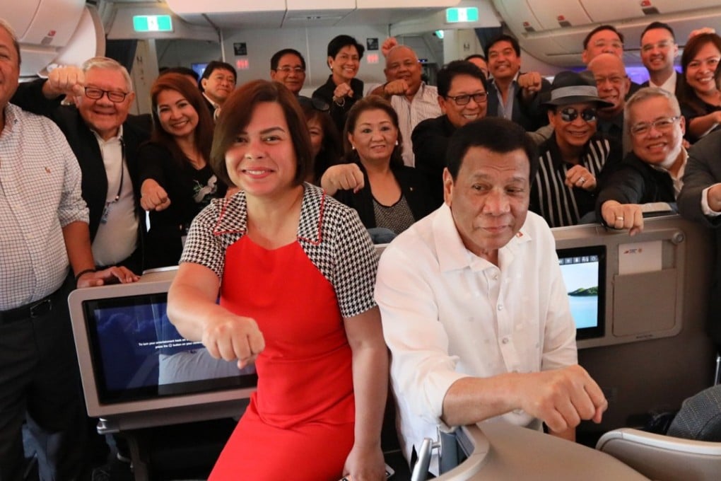 President Rodrigo Duterte with his daughter, Davao City Mayor Sara Duterte-Carpio and members of his delegation during his flight to Israel on September 2, 2018. Photo: EPA