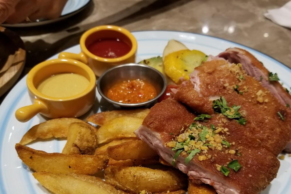Portuguese roasted pork at Café Terceira, in Times Square, one of many classic Macanese dishes influenced by Portuguese cuisine.