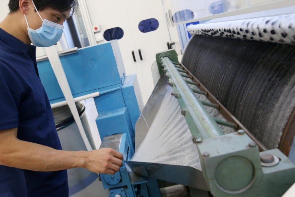 A worker on the production line at the new plant. Photo: David Wong