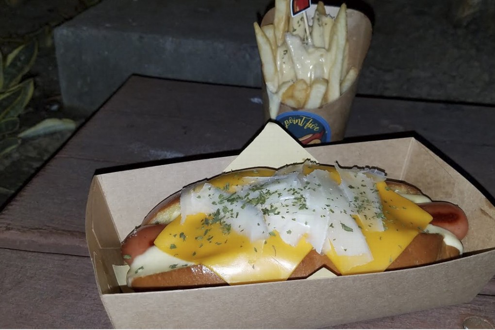 The triple cheese hot dog and fries with cheese sauce at Nine Point Five, Sai Kung, Hong Kong. Photo: SCMP