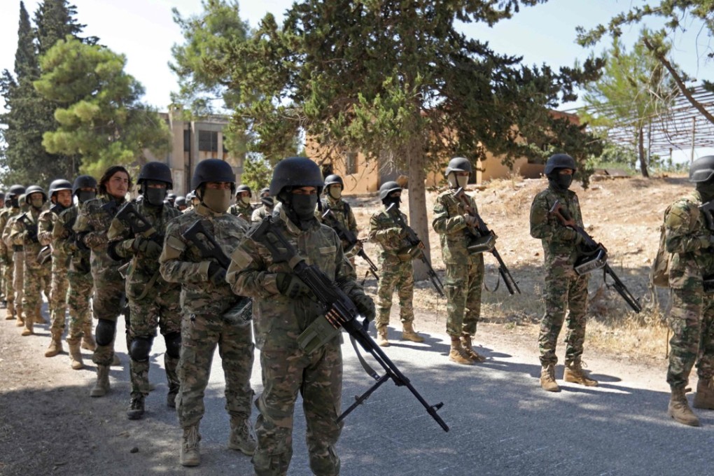 Syrian rebel fighters prepare for an upcoming government forces offensive, in the countryside of the rebel-held northern Idlib province. Photo: AFP