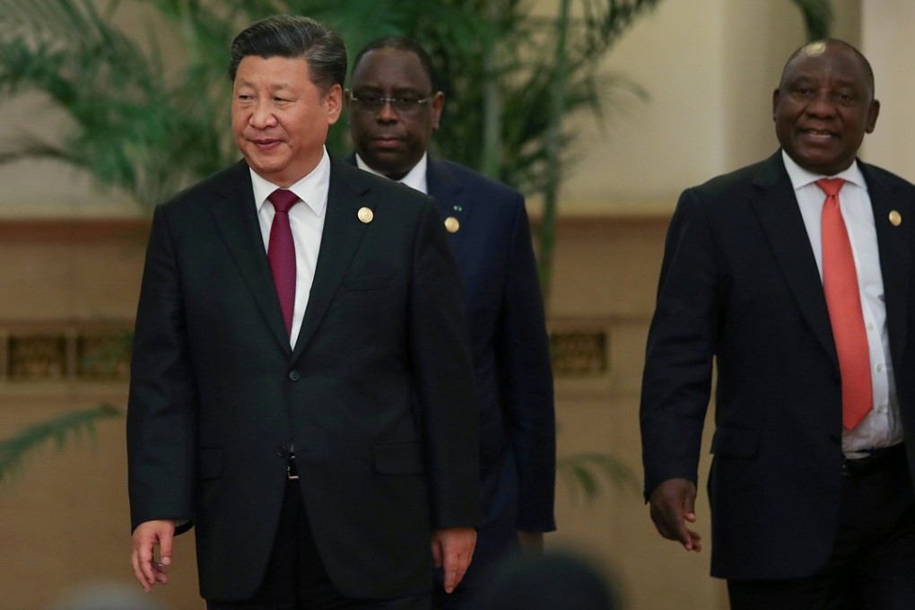 Xi Jinping with South African President Cyril Ramaphosa (right) and Senegalese President Macky Sall (behind) at the forum in Beijing on Tuesday. Photo: Reuters
