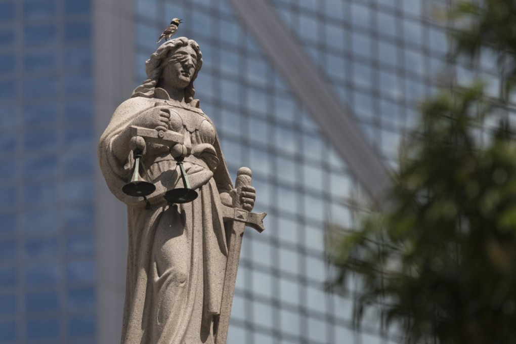 A statue representing justice on the Court of Final Appeal building in Central district, Hong Kong. The city’s leader said its judicial independence would not be compromised under Beijing’s bay area plan. Photo: AFP