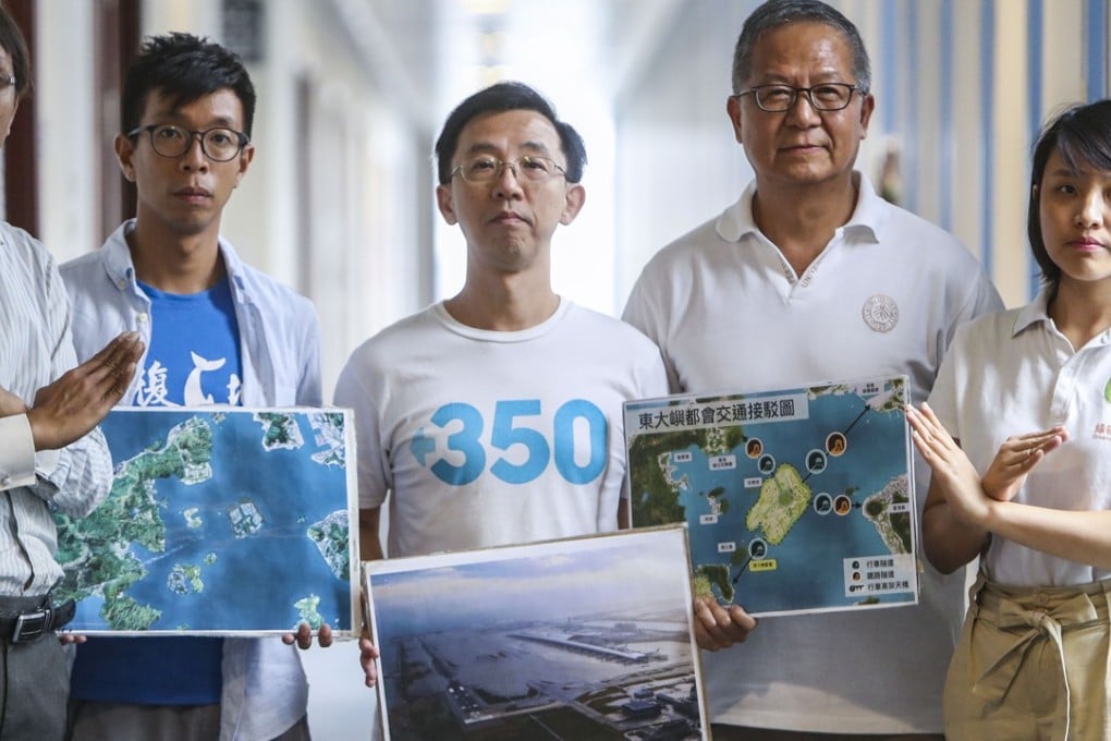 Leung Wing-mo (second from right) with other members of green groups who are speaking up against the island proposal. Photo: Winson Wong