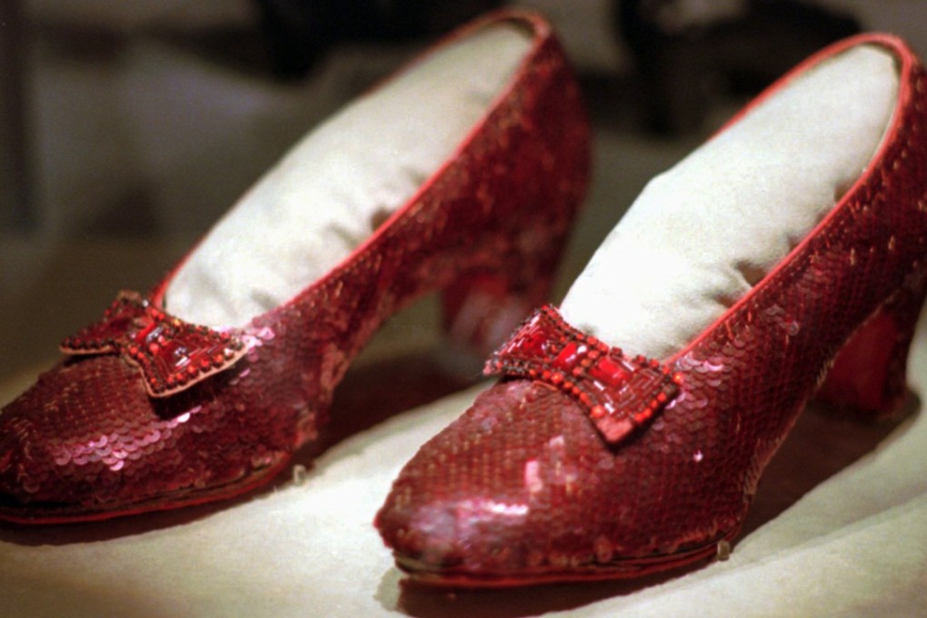 One of the pairs of ruby slippers worn by Judy Garland in the 1939 film ‘The Wizard of Oz’, on display in 1996. Photo: AP