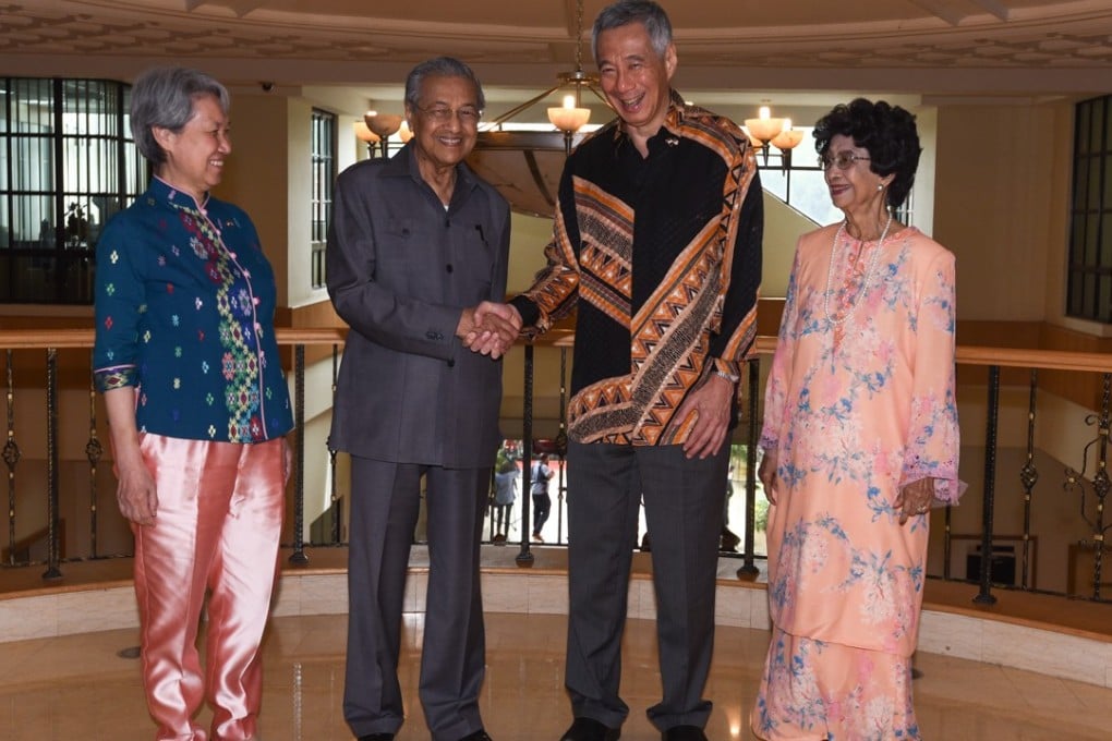 Malaysian Prime Minister Mahathir Mohamad with Singapore Prime Minister Lee Hsien Loong and their wives. Photo: AFP