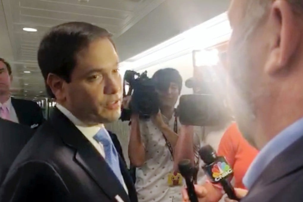 US Senator Marco Rubio (left) rounds on InfoWars host Alex Jones right in the halls of the US Senateafter Jones clapped him on the shoulder, in this still image obtained from social media. Photo: Cassandra Fairbanks / The Gateway Pundit/via Reuters