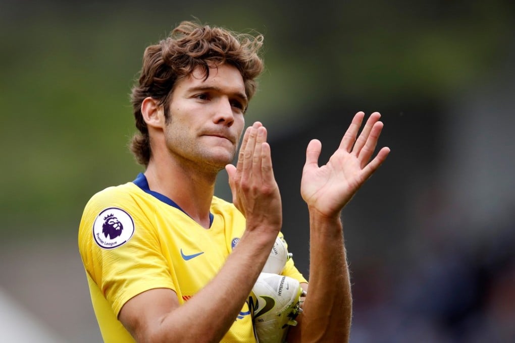 Chelsea's Marcos Alonso celebrates after the English Premier League win over Huddersfield Town. Photo: Reuters