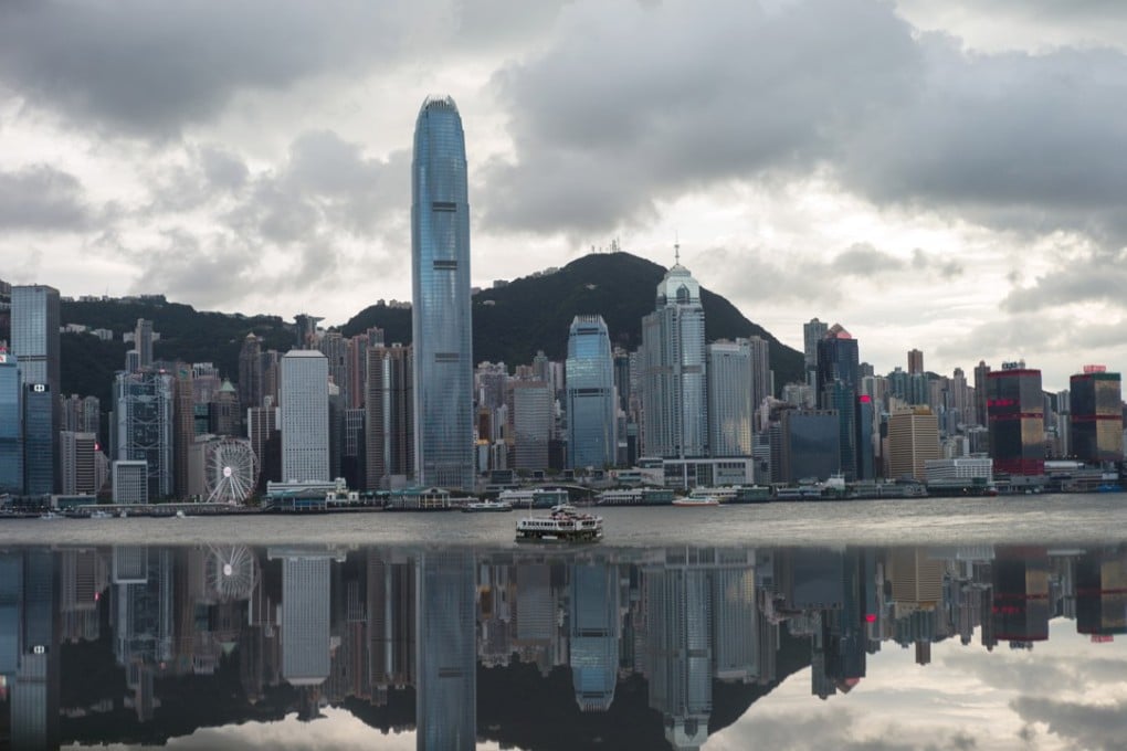 Property prices in the Mid-Levels and other core districts are unlikely to experience corrections until the very rich lose money. Photo: EPA-EFE