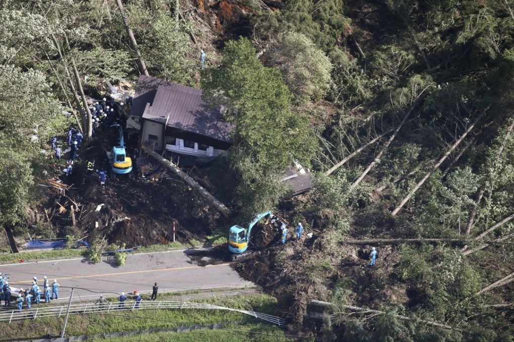 Rescuers searching for survivors at the site of a landslide in Atsuma, Hokkaido, after an earthquake struck the region. Photo: Kyodo