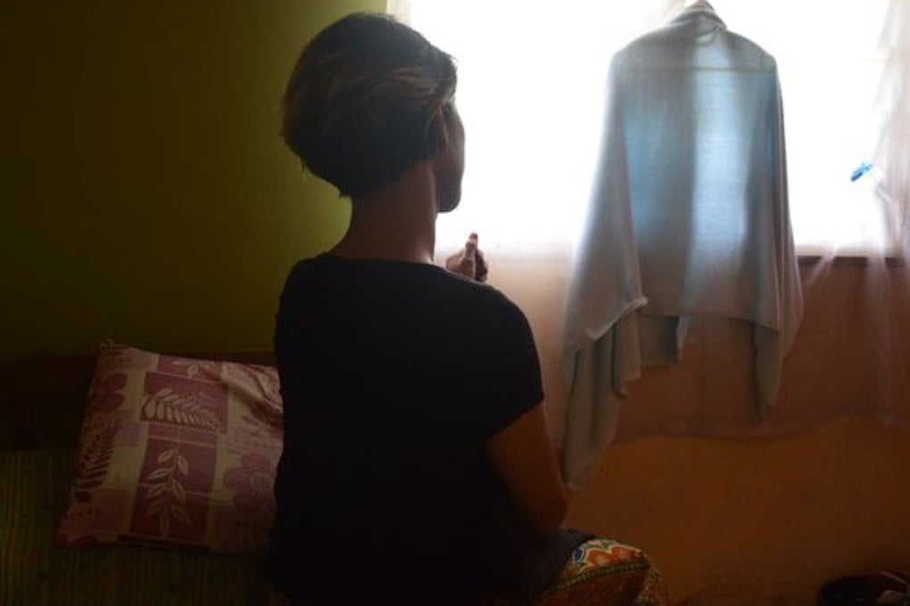 A Malaysian transgender woman who suffered physical assault in Rantau, Malaysia in August. Photo: Reuters