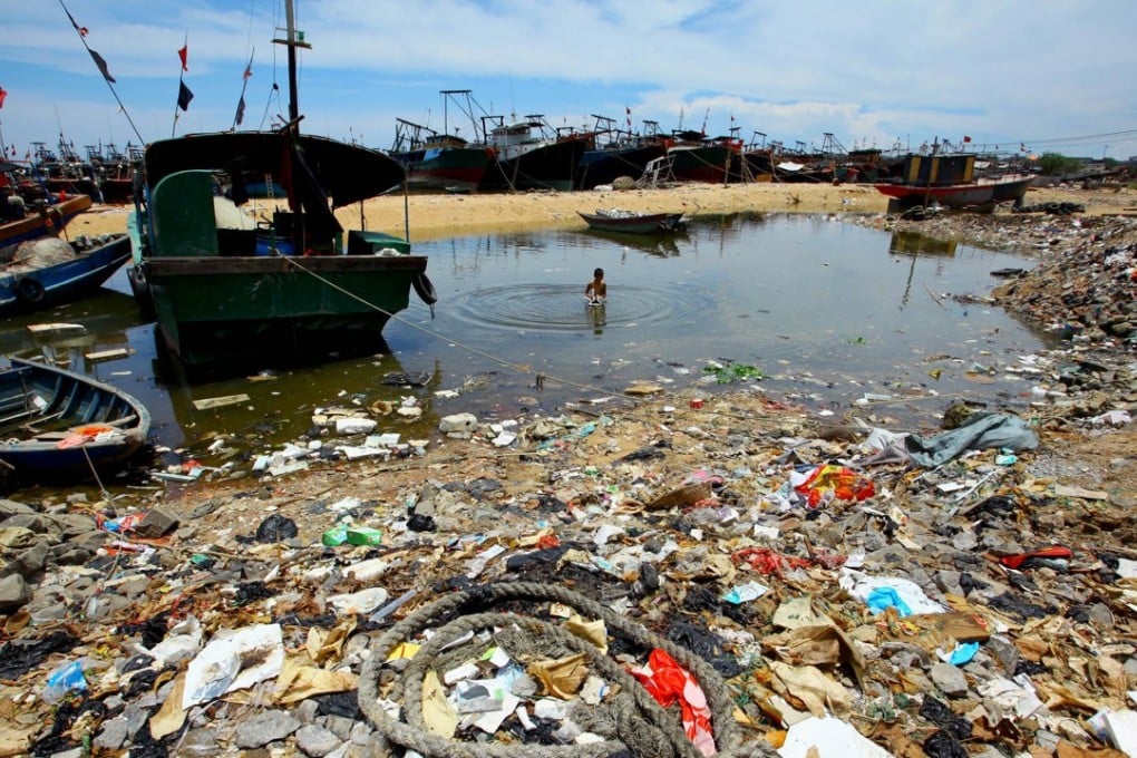 A rubbish-strewn beach in the southern Chinese province of Hainan. Around 10 million tonnes of plastic waste are currently dumped in the sea each year. Photo: AFP