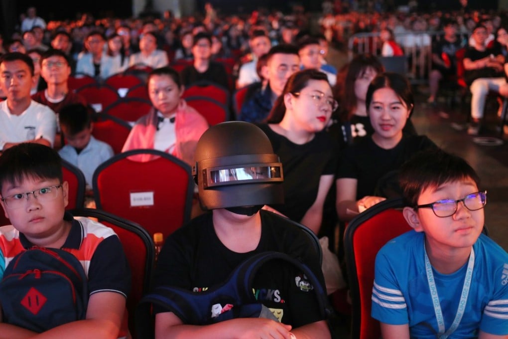 Fans of the multiplayer online game PlayerUnknown's Battlegrounds watch the PUBG world invitational at the Hong Kong Convention and Exhibition Centre in Wan Chai. Photo: Winson Wong
