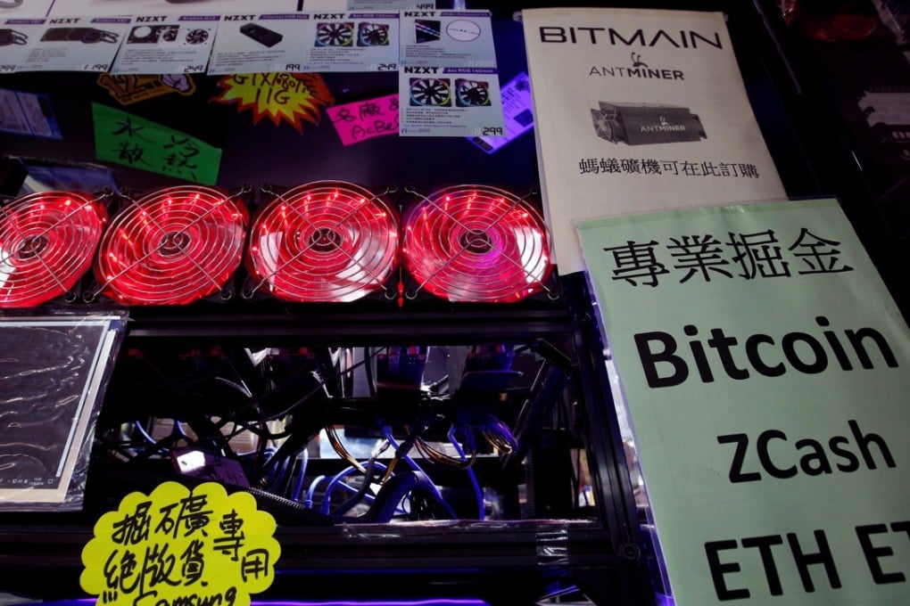 A cryptocurrency mining computer equipped with cooling fans is displayed at a computer mall in Hong Kong on May 17, 2018. Photo: Reuters