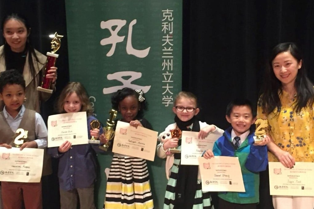 Mandarin immersion teachers Yuting Huang (left) and Jing Votruba accompany Global Ambassadors Language Academ primary school pupils to an annual Chinese Speech Contest at Cleveland State University. Photo: Meran Rogers/Global Ambassadors Language Academy