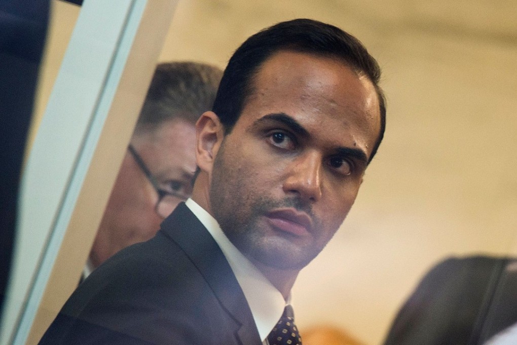 George Papadopoulos goes through security for his sentencing in Washington on Friday. Photo: AFP
