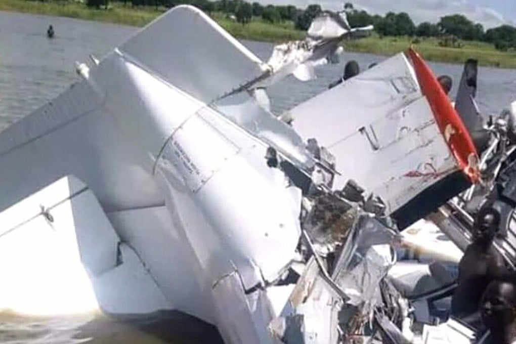 The wreckage of a light aircraft that crashed into the Yirol River. Photo: AFP/RADIO MYRAYA