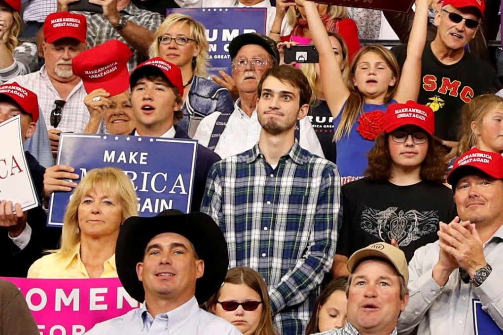 Tyler Linfesty, aka ‘Plaid Shirt Guy’, believes he was asked to leave Trump rally because he wasn’t enthusiastic enough. Photo: Reuters