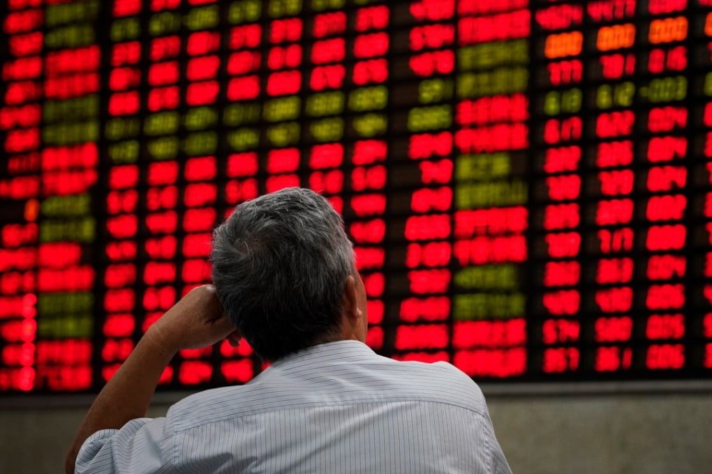 Former central bank governor Zhou Xiaochuan said the trade war was a “major reason” behind the recent slump in Chinese stocks. Photo: Reuters
