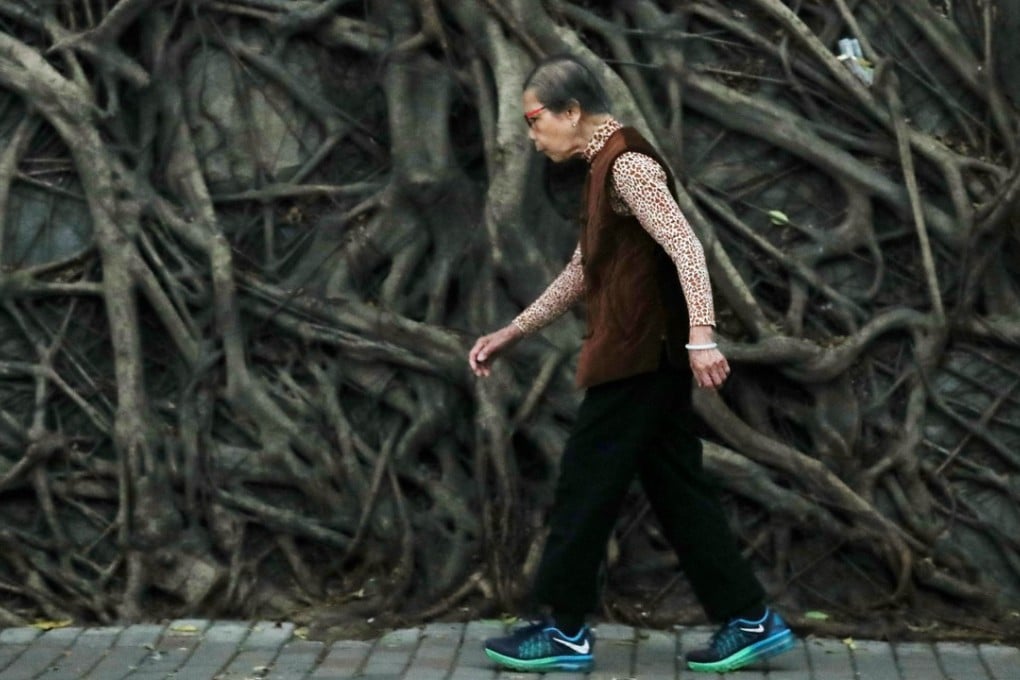 An elderly woman in Kennedy Town. Hongkongers walk more than anyone else in the world. Photo: Nora Tam