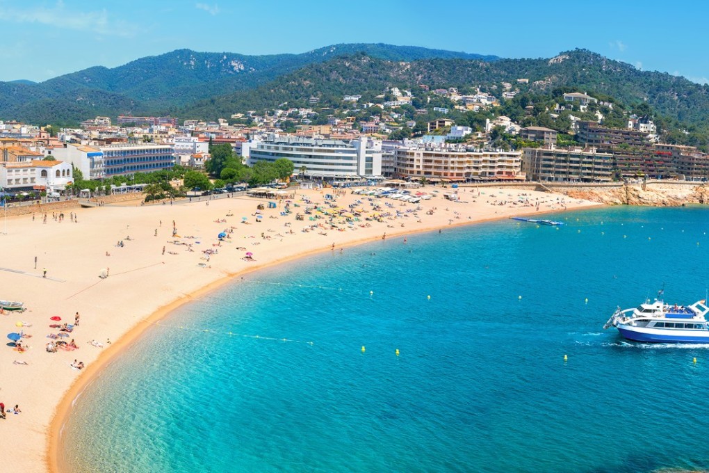 Panoramic view of the beach at Tossa de Mar on the Costa Brava in Catalonia, Spain Photo: Shutterstock