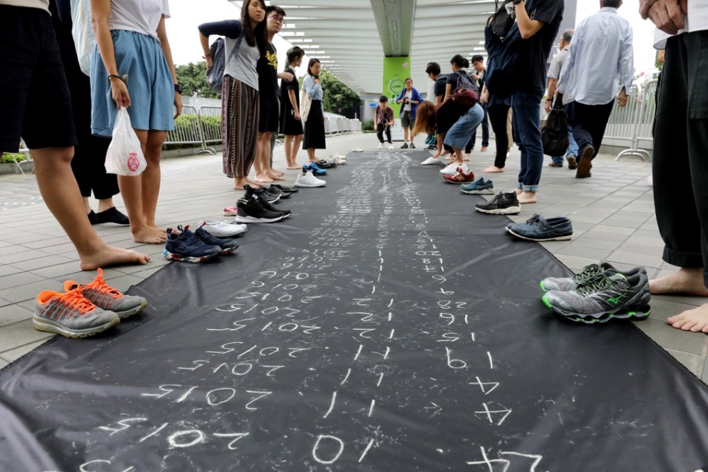 Public appeals are made in Admiralty on Monday to Hong Kong’s labour and welfare chief to mark World Suicide Prevention Day. Photo: Dickson Lee