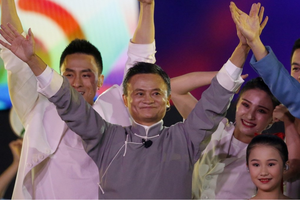 Jack Ma, executive chairman of Alibaba Group, waves to the audience during the closing ceremony for the 18th Asian Games in Jakarta, Indonesia. Photo: AP