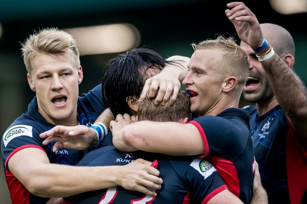 Hong Kong celebrate after beating Cook Islands in their Rugby World Cup qualifier. Photo: HKRU