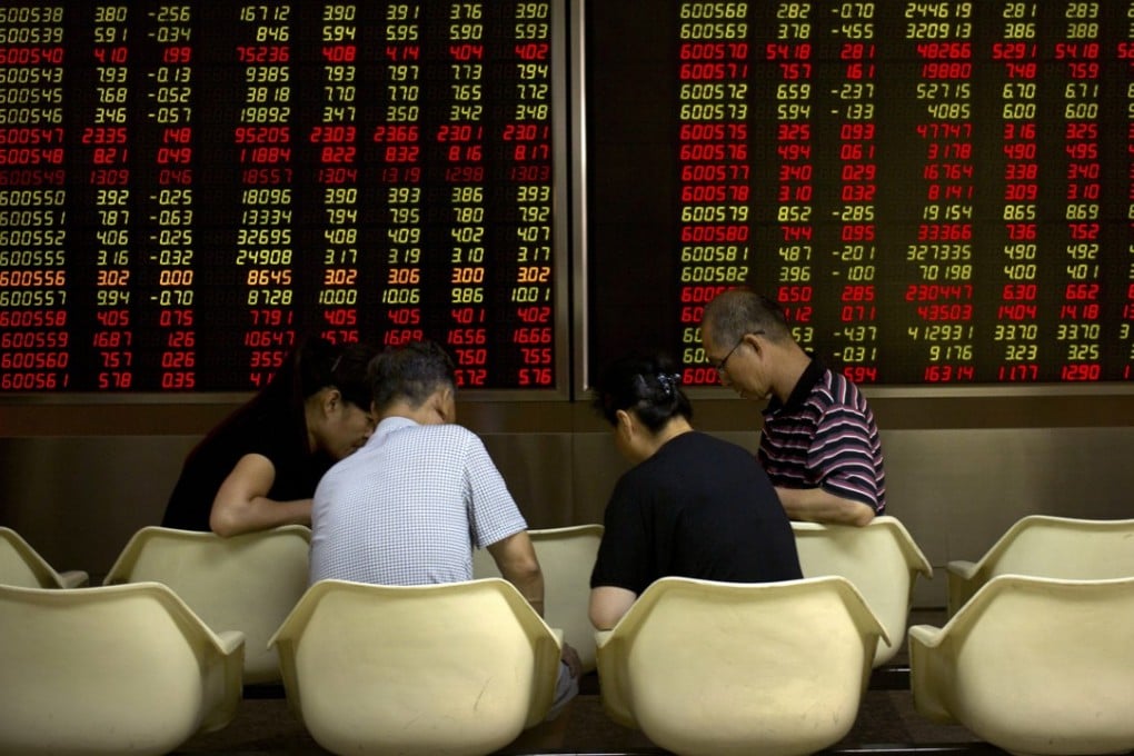 A brokerage house in Beijing. Chinese stocks are expected to continue to hurt investors. Photo: AP