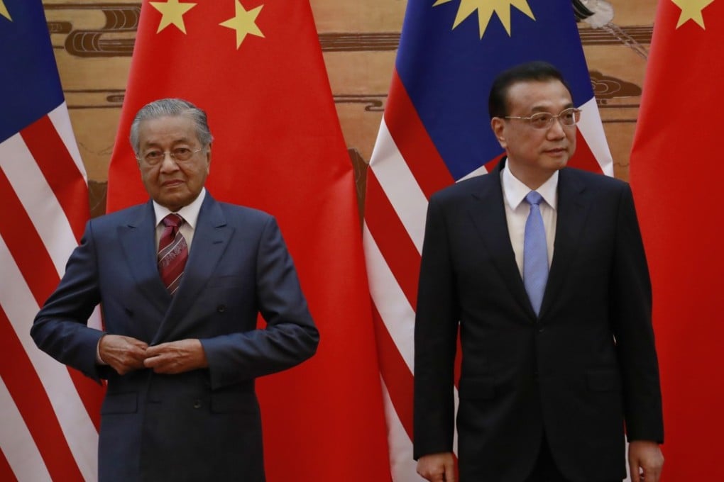 Malaysian Prime Minister Mahathir Mohamad with Chinese Premier Li Keqiang in Beijing in August. Photo: AFP