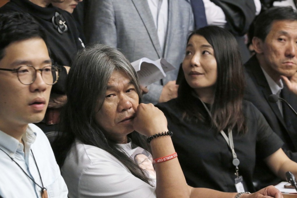 Pro-democracy lawmakers (from left) Nathan Law Kwun-chung, Leung Kwok-hung, Lau Siu-lai and Edward Yiu, at a news conference in Hong Kong on July 14, 2017, after they were disqualified from office for having turned their oath-taking into apparent protests against Beijing. Photo: AP