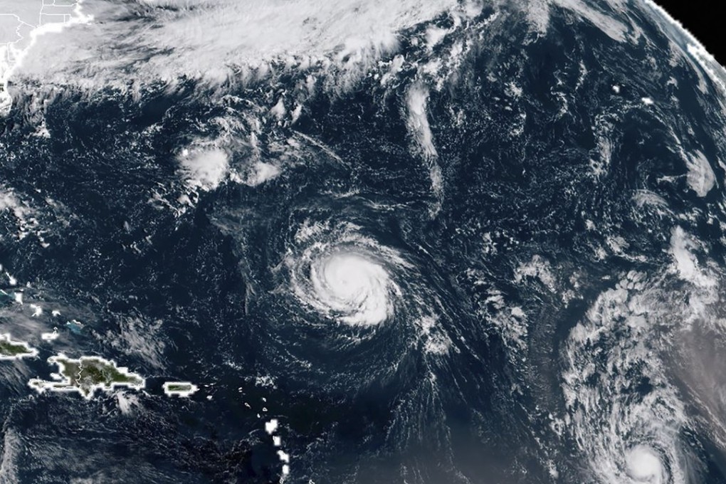 A satellite image taken on September 9 shows Hurricane Florence, Tropical Storm Isaac and Hurricane Helene in the Atlantic Ocean. Photo: AFP/ NOAA/RAMMB