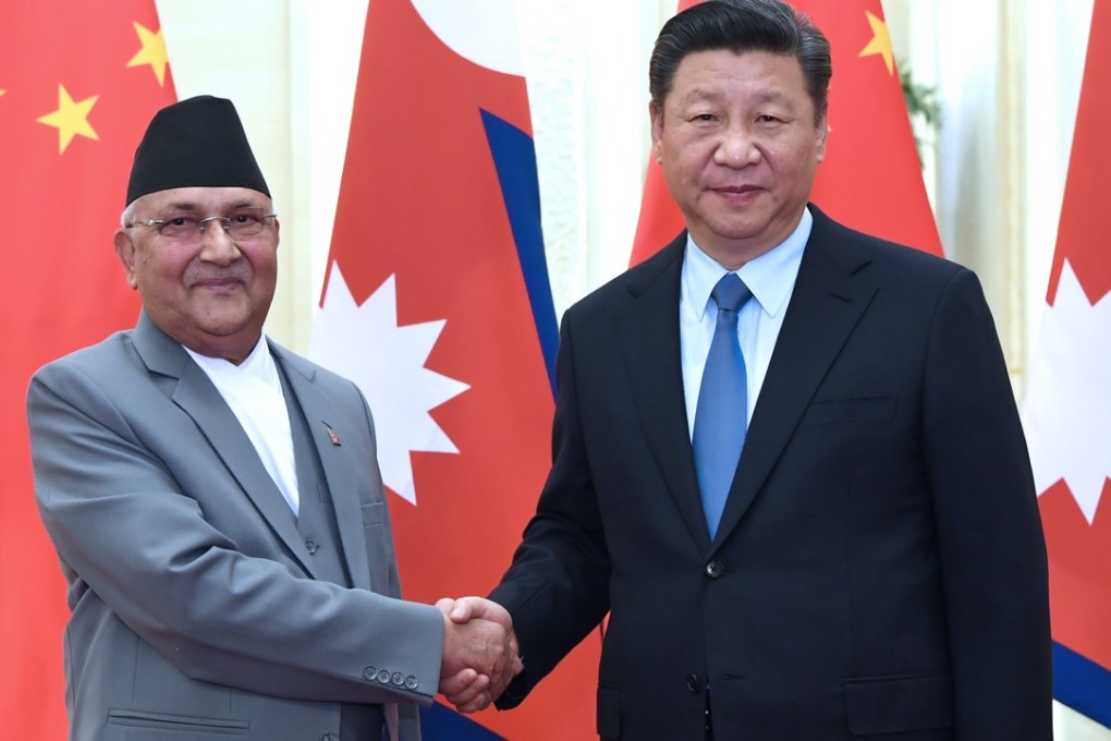 Chinese President Xi Jinping meets Nepal Prime Minister Khadga Prasad Sharma Oli on his 2016 Beijing visit. Photo: EPA