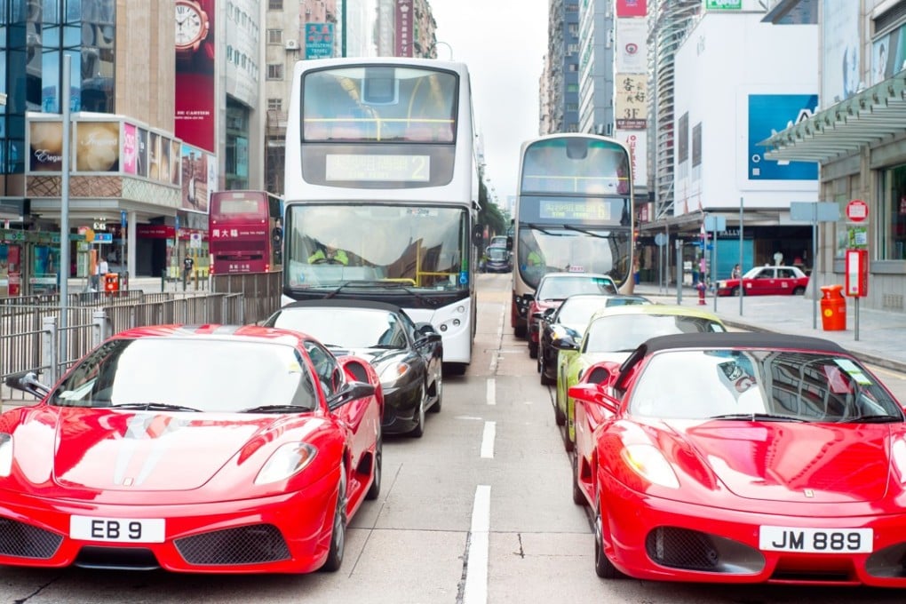 In a city with 93 US dollar billionaires and a million US dollar millionaires, are Ferraris still status symbols? Some 39 were registered in 2017 alone. Photo: Alamy
