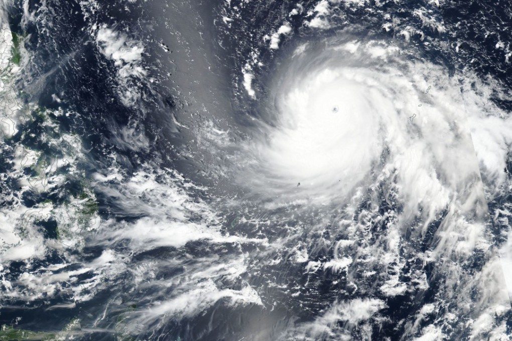 A Nasa satellite photo shows Super Typhoon Mangkhut approaching the Philippines on September 11. Its name is the Thai word for a fruit. Photo: EPA-EFE/Nasa
