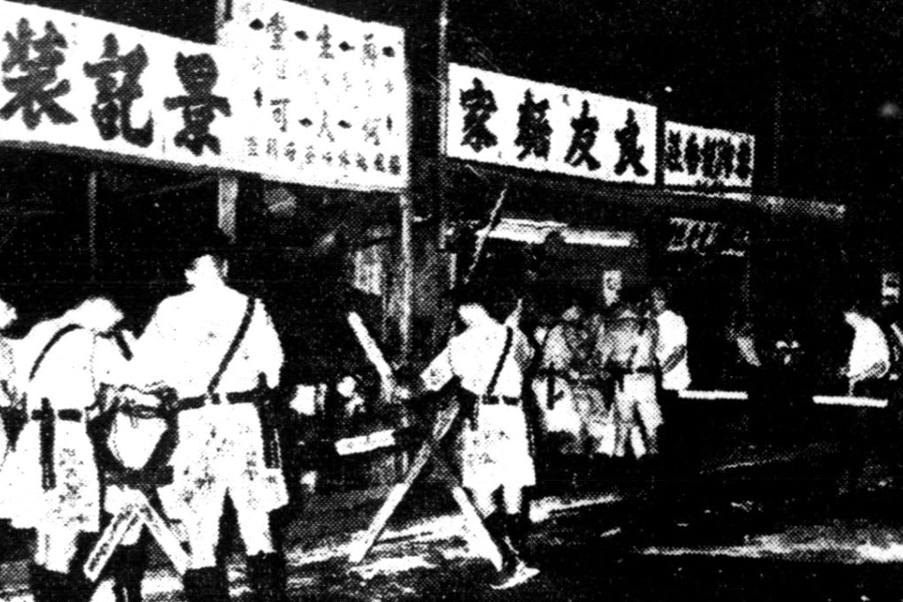 Police officers at the scene of the explosion in Kowloon Tsai, in Hong Kong, in September 1965. Picture: SCMP