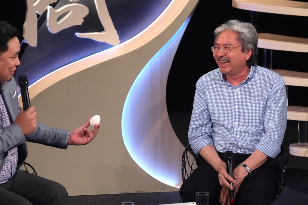 John Tsang speaking to former aide Julian Law at the forum. Photo: Xiaomei Chen